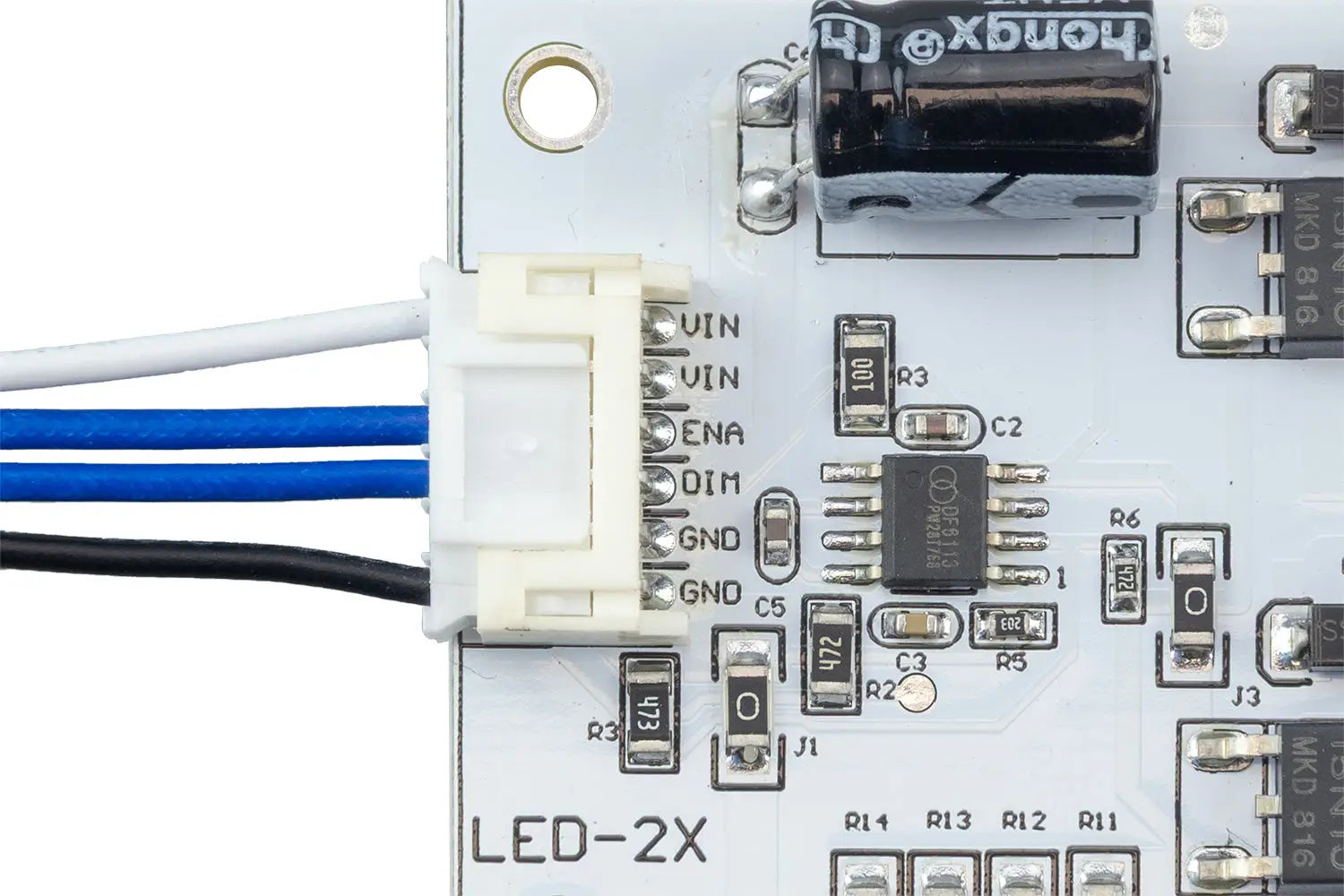 white rectangular led driver board with black capacitors and silver circuitry for led replacement and ccfl conversion power supply