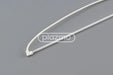 White plastic cable tie with smooth glossy finish and rectangular head used in ccfl backlight assembly for sharp lm10v33