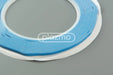 A roll of blue 3mm double sided tape with white backing neatly wound on a neutral gray surface full 25m roll