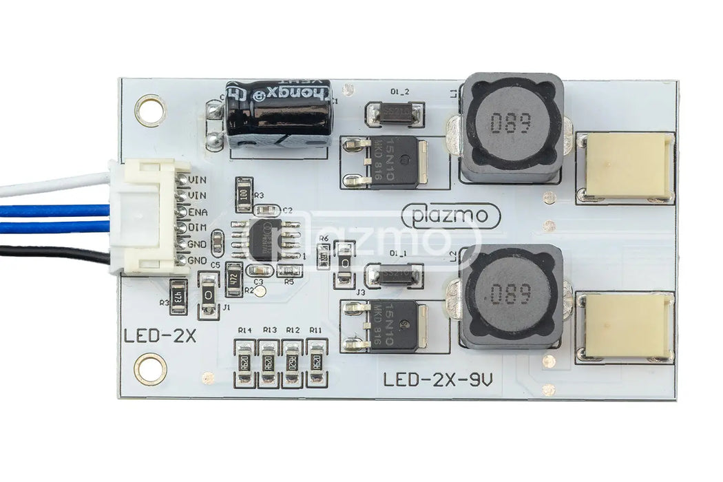 White rectangular led driver board with black capacitors and silver circuitry for led replacement and ccfl conversion power supply