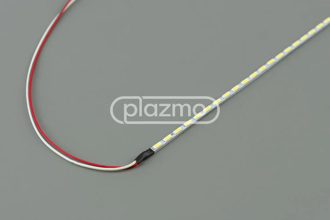 A flexible universal led strip with white lights in a translucent silver casing for led replacement and ccfl conversion