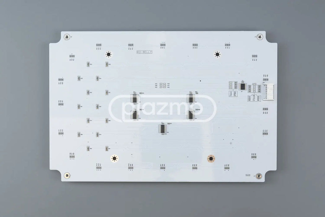 White rectangular led board with black surface mount components and silver solder pads for konami podium belly door