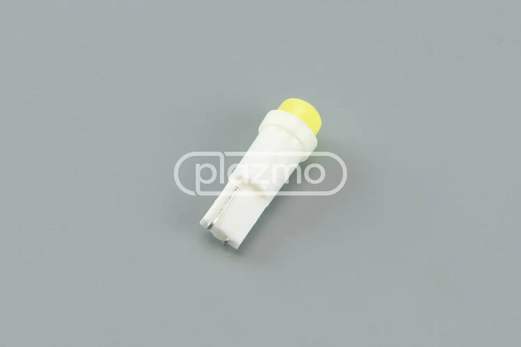 White led indicator lamp with yellow translucent cap and two metallic contacts for t5 wedge 12 volt round head use